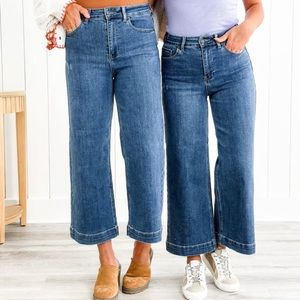 Risen high rise medium wash jeans